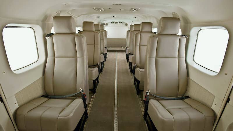 Premium executive cabin interior with luxury leather seating inside a Cessna Grand Caravan EX