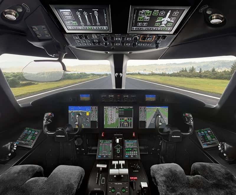 Next-generation Gulfstream Harmony Flight Deck with advanced touchscreen glass displays inside a modern G300 private jet