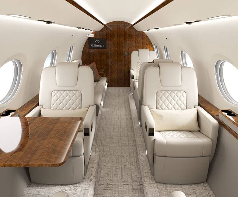 Spacious multi-zone executive cabin interior of a Gulfstream G300 private jet for charter flights