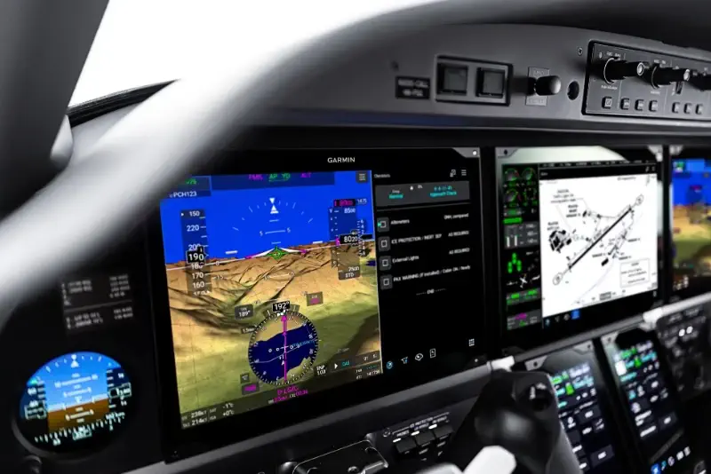 Advanced glass cockpit avionics suite and modern flight deck instrumentation inside a Pilatus PC-12 turboprop aircraft